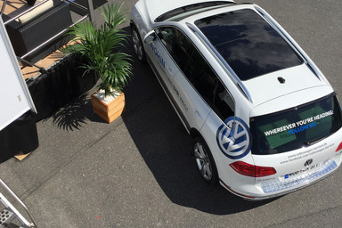 New Volkswagen car in front of Rainbow's mobile Volkswagen showroom Image 3