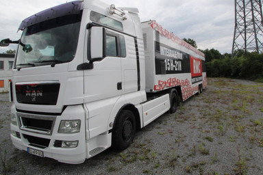 Side view of the Showtruck for RMC Sport Image 1