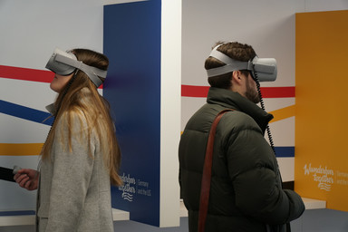 A man and a woman using VR glasses Image 17