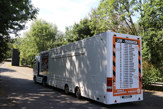 Expert Showtruck with its tour data on the backside