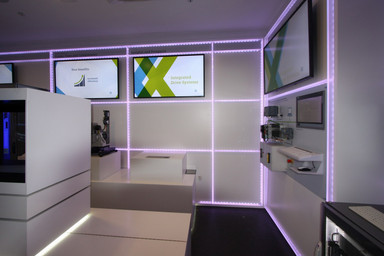 Purple LED lighting with screens inside the showroom for Siemens Image 4