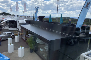 View from above on the mobile showroom for Isdera from Rainbow Image 8