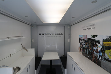 Interior of the InfoWheels with Pantry kitchen and Lounge Image 13